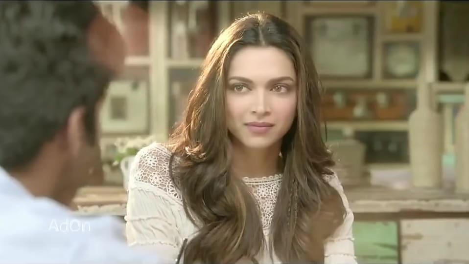 Get Deepika Padukone Long Wavy Center Part Hairstyle In