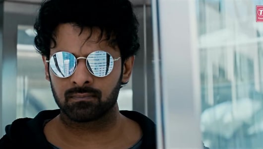 Celebrity Hairstyle Of Prabhas From Official Trailer Saaho 2019 Charmboard Directed by sujeeth, saaho marks the telugu language film debut of shraddha kapoor. hoodie