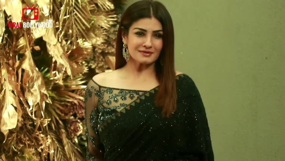 Raveena Tandon In Black Saree Outfit Celebrity Clothing Charmboard Get a huge range of bollywood sarees online in stunning designs flaunted by your favorite actresses. saree