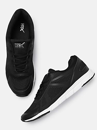 Tiger Shroff Celebrity Fashion Footwear In Outfit Name Charmboard Kläder i stilren design gjorda i högkvalitetsmaterial med en stolt attityd. tees