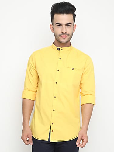 yellow shirt with black jeans